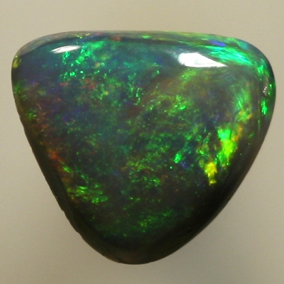 SOLID BLACK OPAL Bright green and orange over dark green